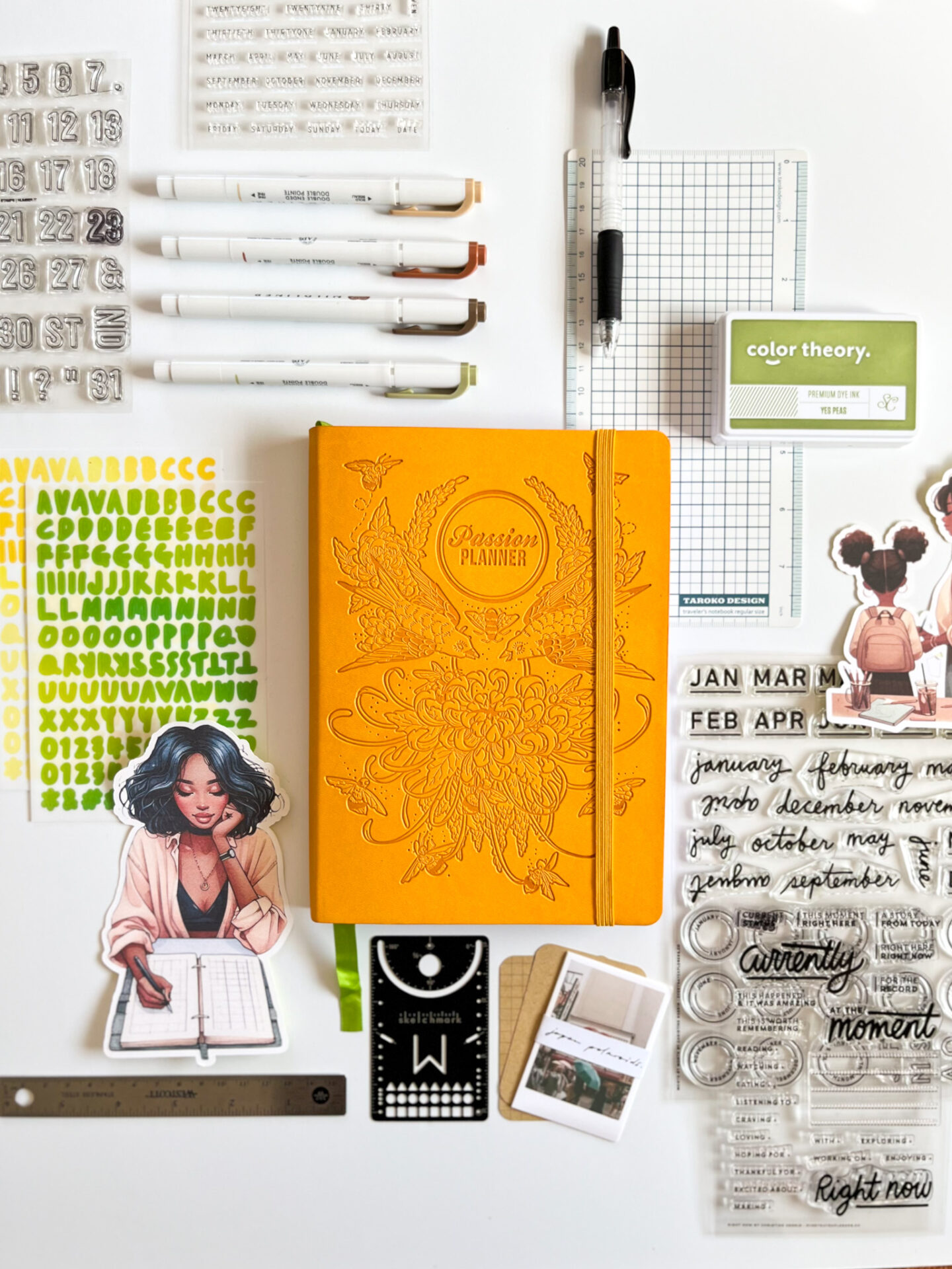 journal supply favorites - notebook, stencil bookmark, ruler, stamps, inks, stickers, mildliner markers, handwriting board, pen, and stickers. 